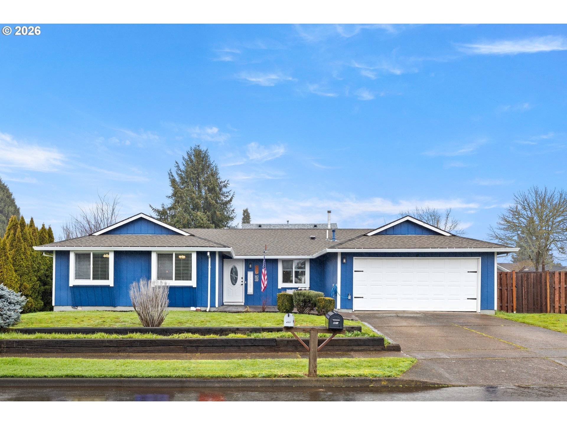 493 South Emerald Loop Cornelius, OR 97113 - Photo 1 of 46 a front view of a house with a yard