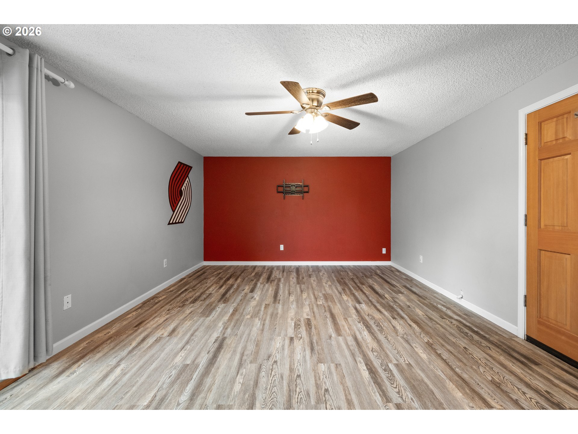 493 South Emerald Loop Cornelius, OR 97113 - Photo 20 of 46 a view of an empty room and wooden floor