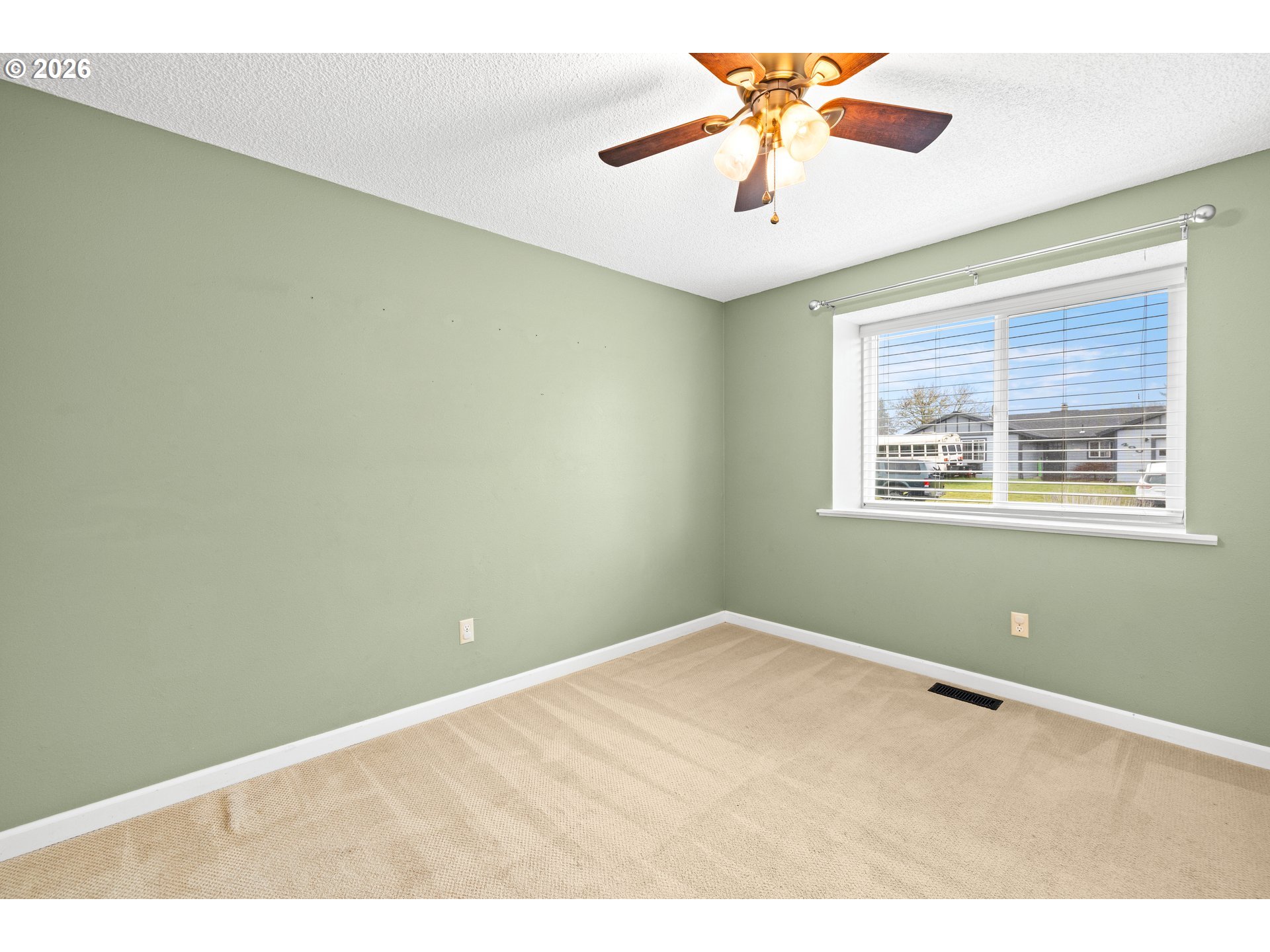 493 South Emerald Loop Cornelius, OR 97113 - Photo 23 of 46 a view of room with window and ceiling fan