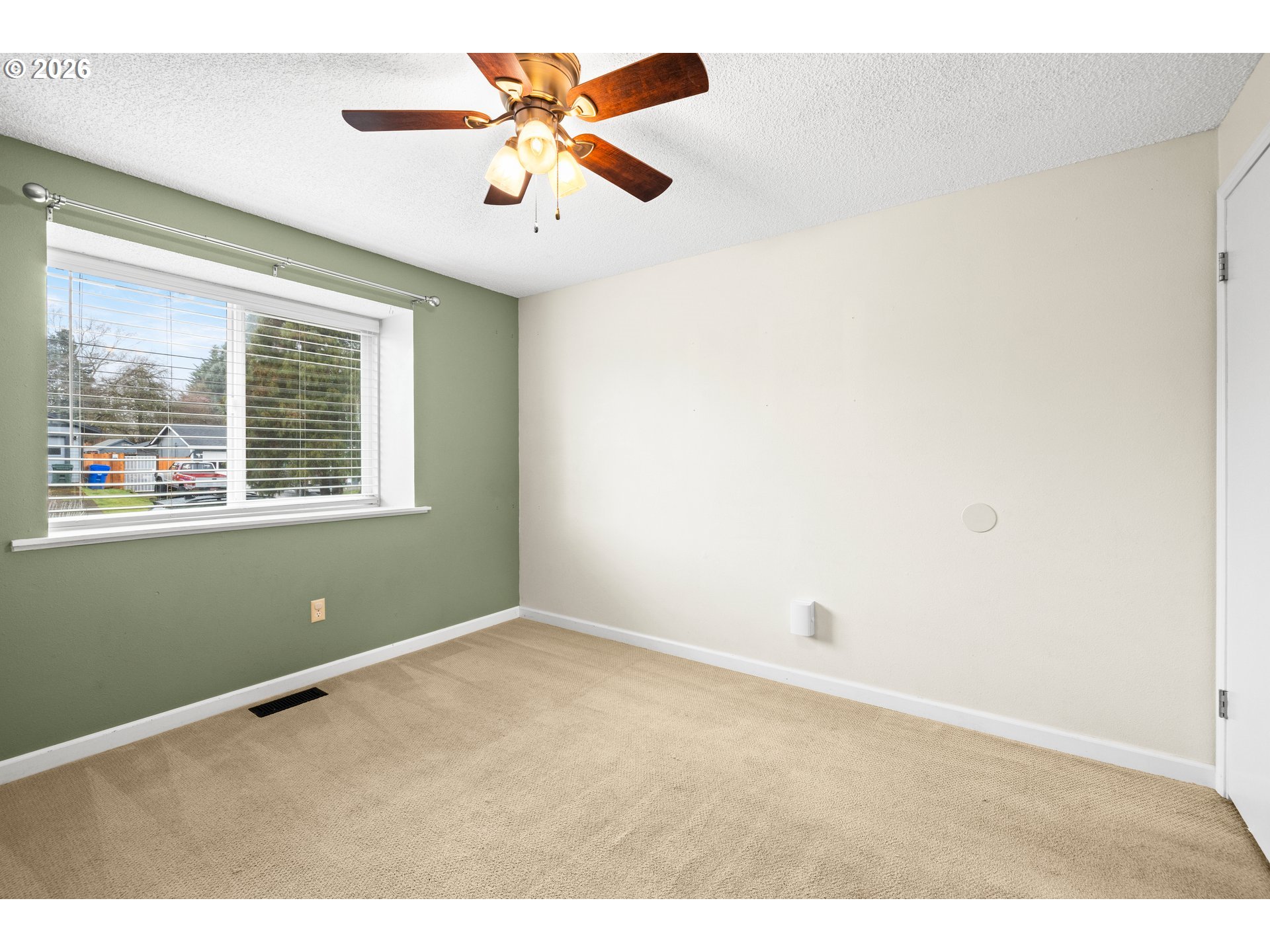 493 South Emerald Loop Cornelius, OR 97113 - Photo 24 of 46 a view of an empty room with a window