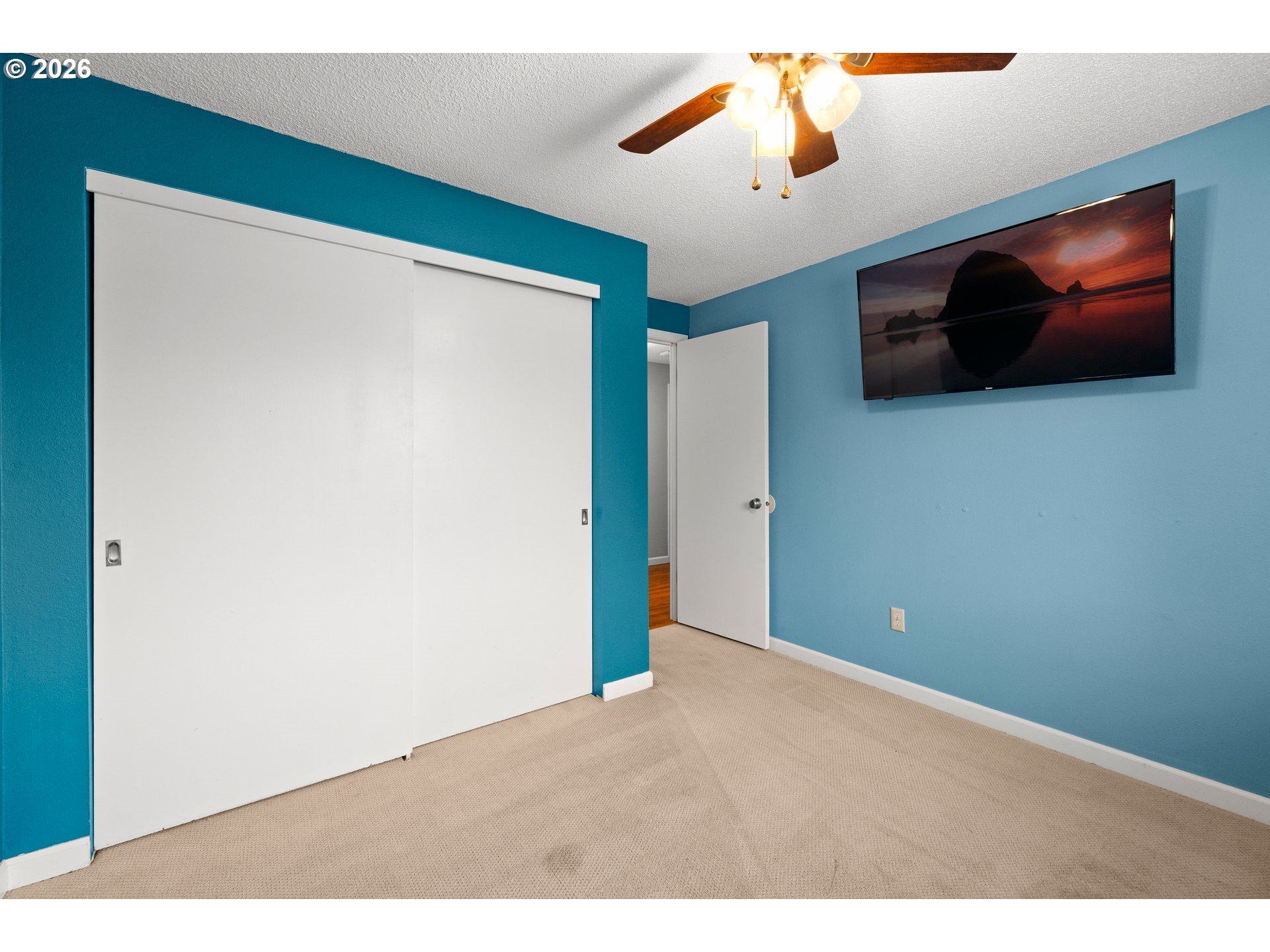 493 South Emerald Loop Cornelius, OR 97113 - Photo 28 of 46 a view of a livingroom with a flat screen tv