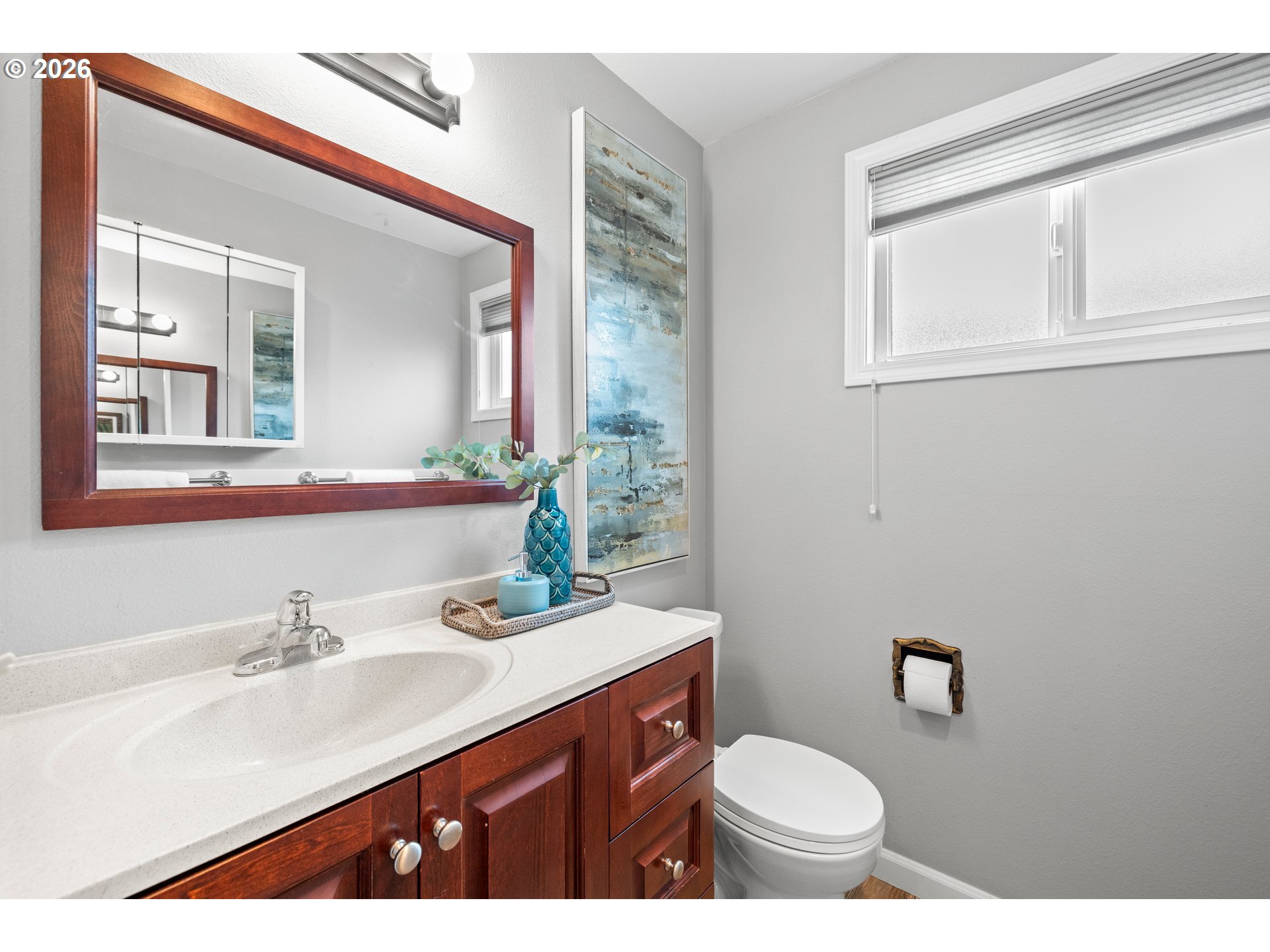 493 South Emerald Loop Cornelius, OR 97113 - Photo 33 of 46 a bathroom with a granite countertop toilet sink and mirror