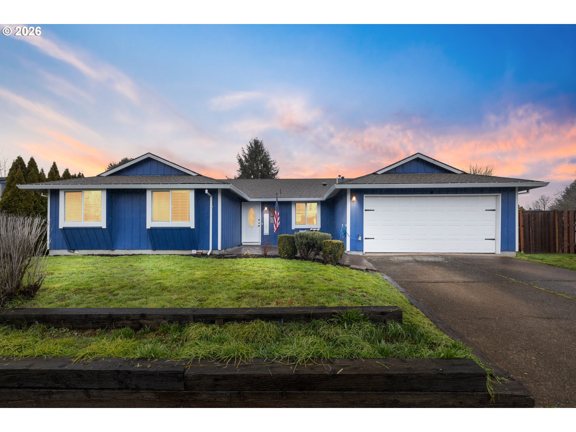 493 South Emerald Loop Cornelius, OR 97113 - Photo 42 of 46 a front view of a house with a garden