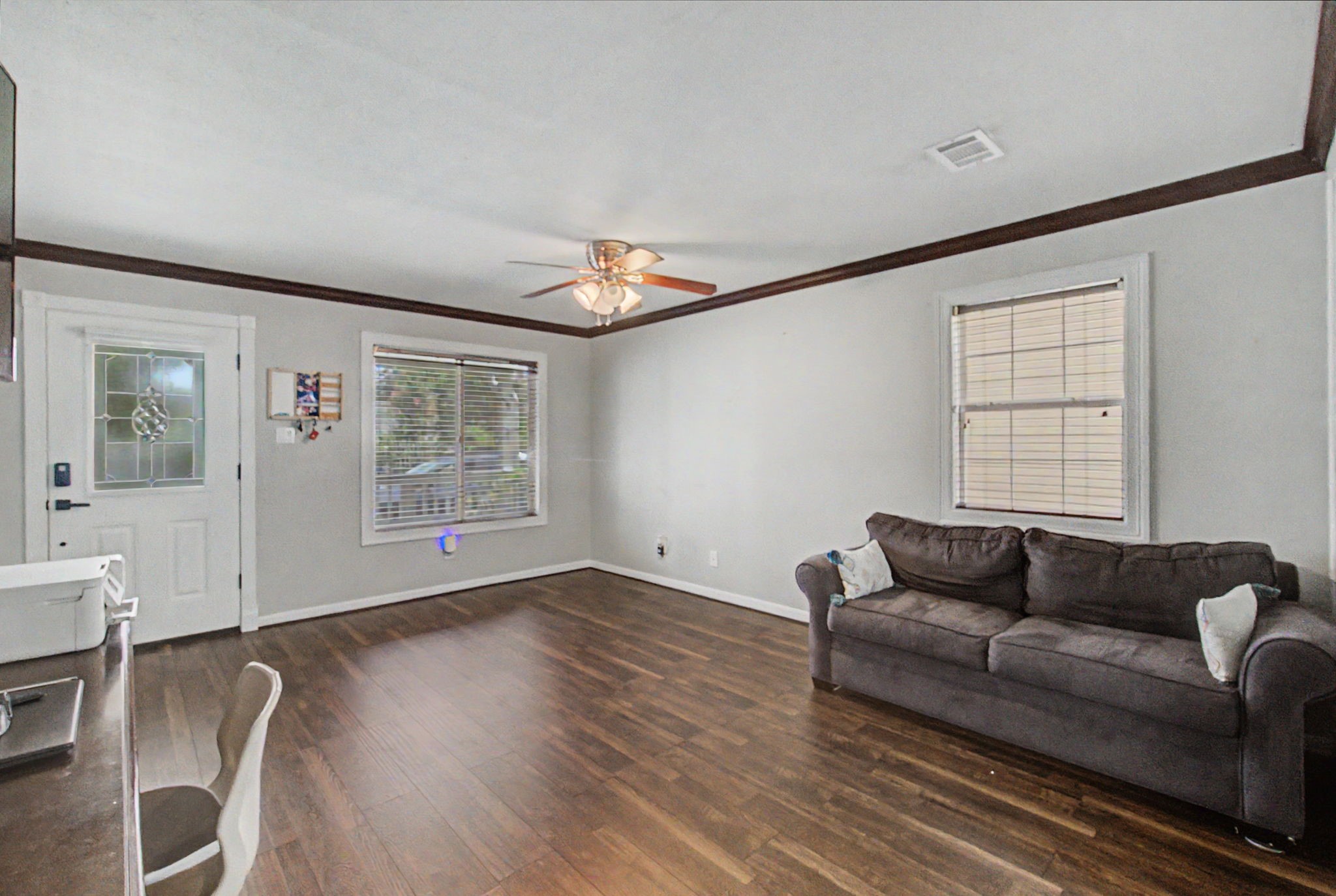 10034 Alfred Lane Houston, TX 77041 - Photo 13 of 50 Whether hosting guests or enjoying a quiet evening, this spacious living room is designed for effortless comfort.