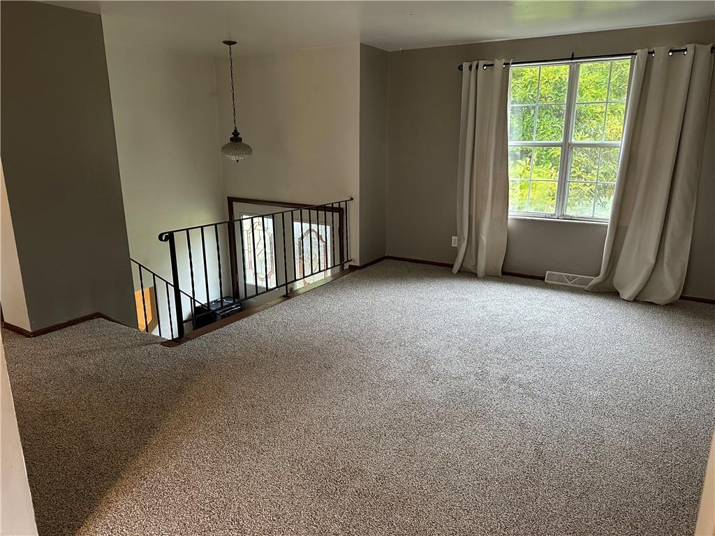 3366 Frew Mill Road New Castle, PA 16101 - Photo 3 of 10 a view of an empty room with a window