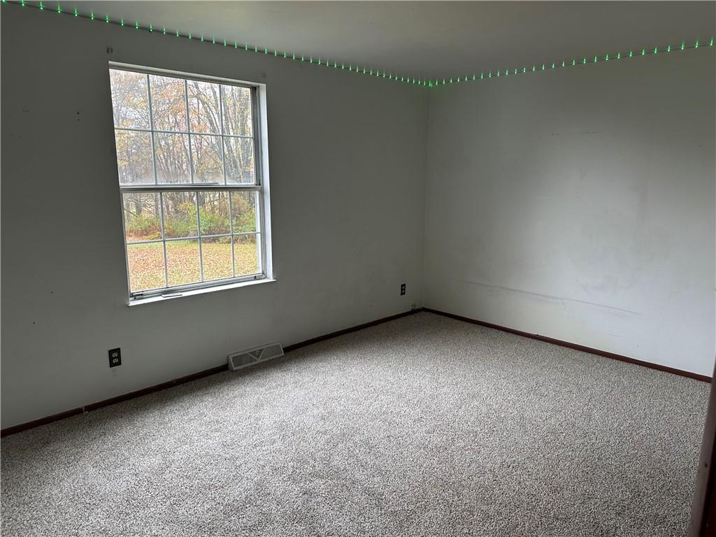 3366 Frew Mill Road New Castle, PA 16101 - Photo 8 of 10 an empty room with a window
