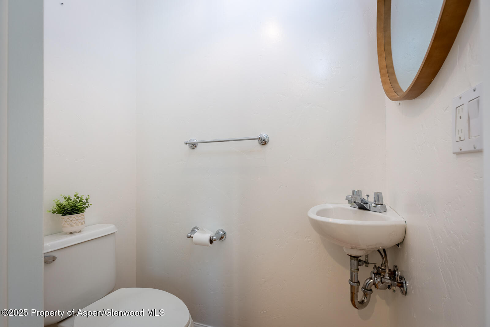 200 Lakeside Court Basalt, CO 81621 - Photo 12 of 23 a bathroom with a sink a toilet and a mirror