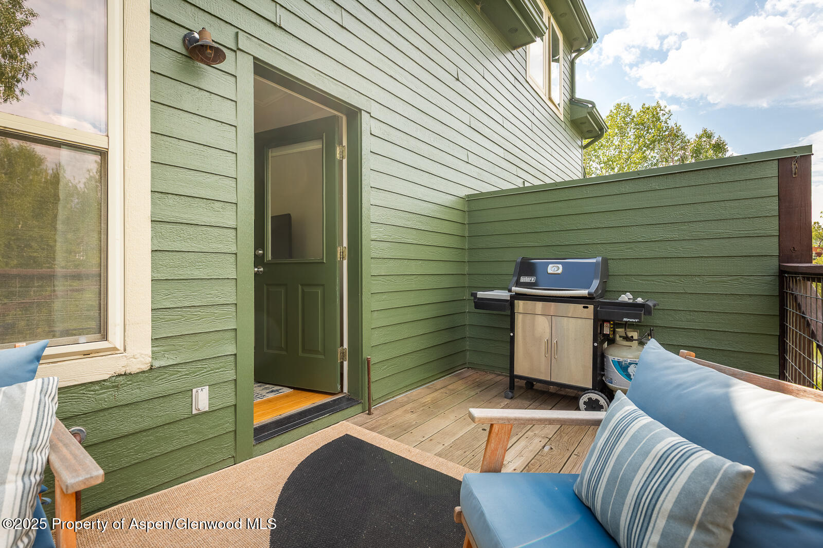 200 Lakeside Court Basalt, CO 81621 - Photo 15 of 23 a view of a patio with couches chairs and a potted plant