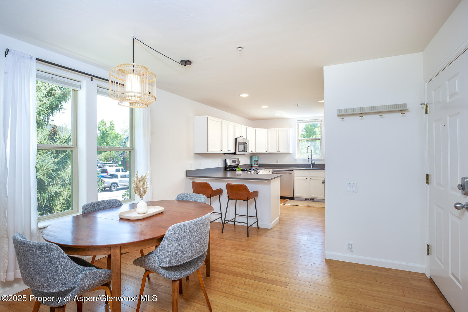 200 Lakeside Court Basalt, CO 81621 - Photo 2 of 23 a kitchen with a table and chairs in it