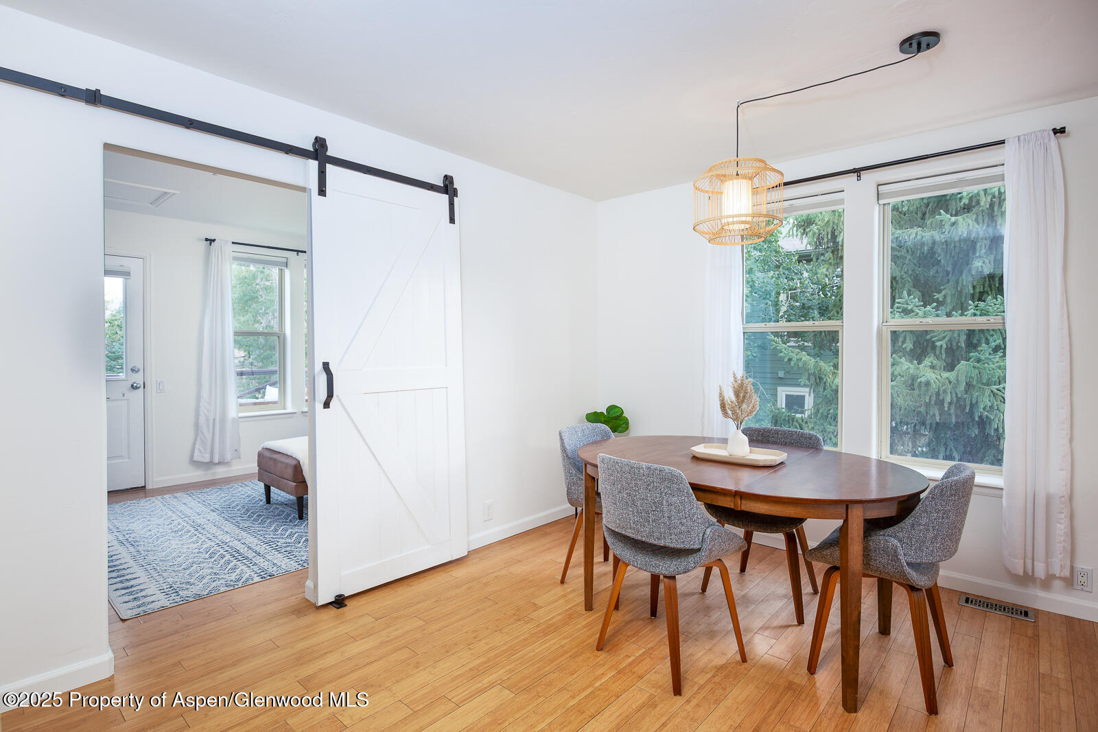 200 Lakeside Court Basalt, CO 81621 - Photo 4 of 23 a view of a dining room with furniture window and wooden floor