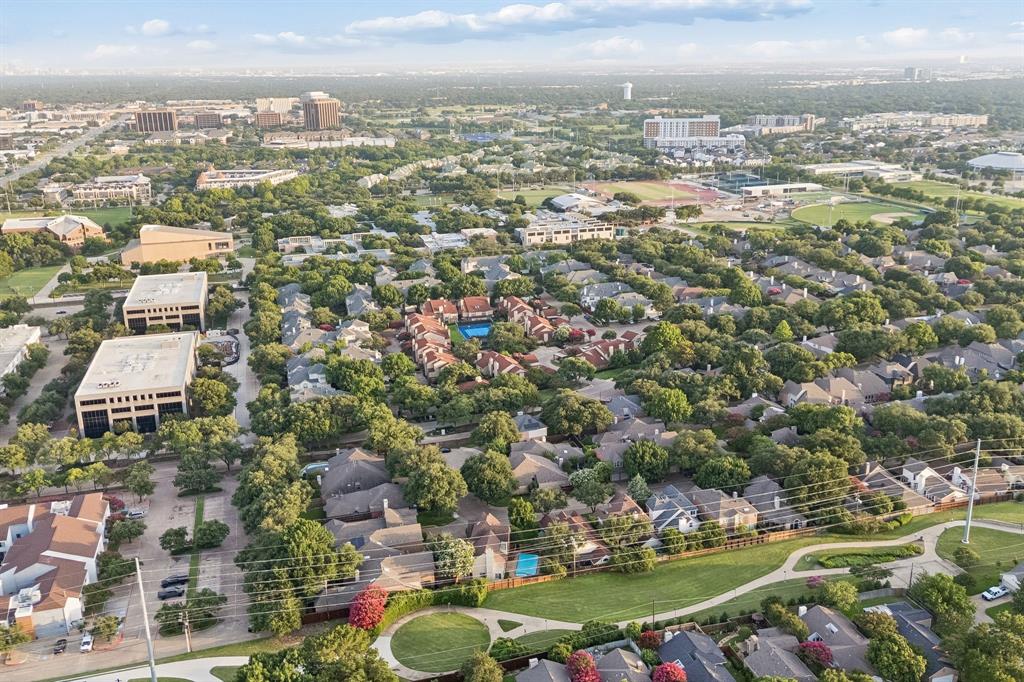 4115 Rive Lane Addison, TX 75001 - Photo 25 of 25 Aerial perspective showcasing a residential community with mature tree coverage