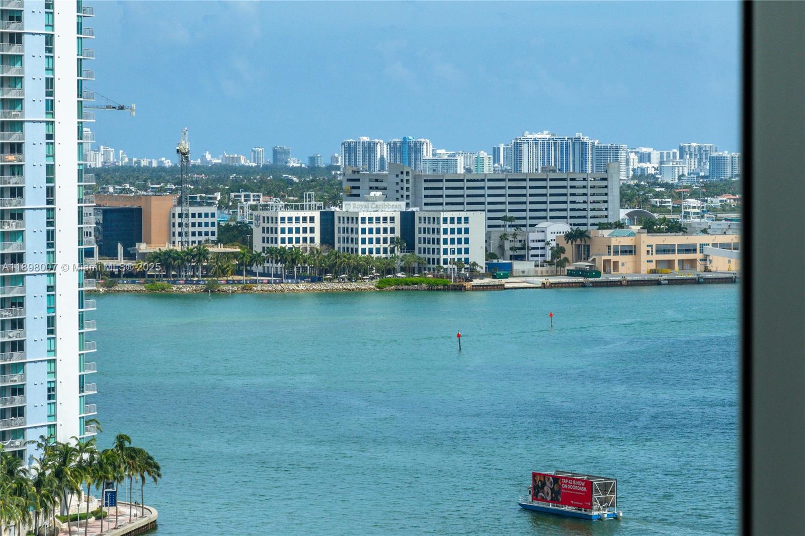 465 Brickell Avenue, Unit 1602 Miami, FL 33131 - Photo 17 of 30 a view of a city with tall buildings and a big yard