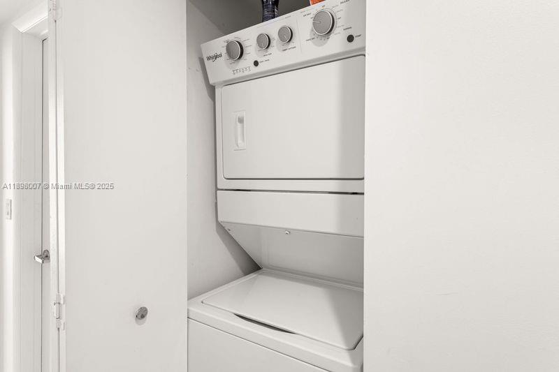 465 Brickell Avenue, Unit 1602 Miami, FL 33131 - Photo 18 of 30 a close up of a washer and dryer