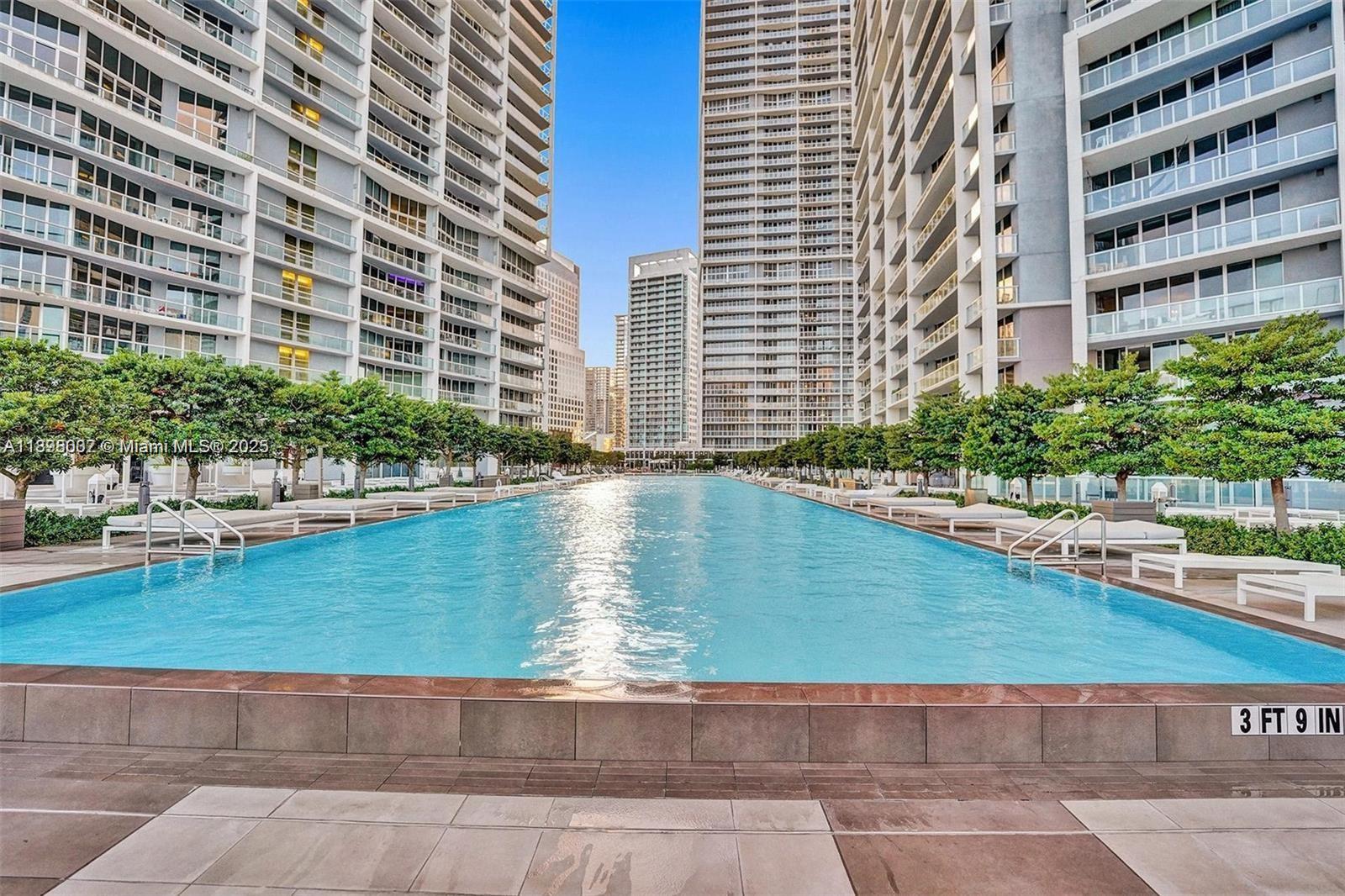 465 Brickell Avenue, Unit 1602 Miami, FL 33131 - Photo 22 of 30 a house with swimming pool