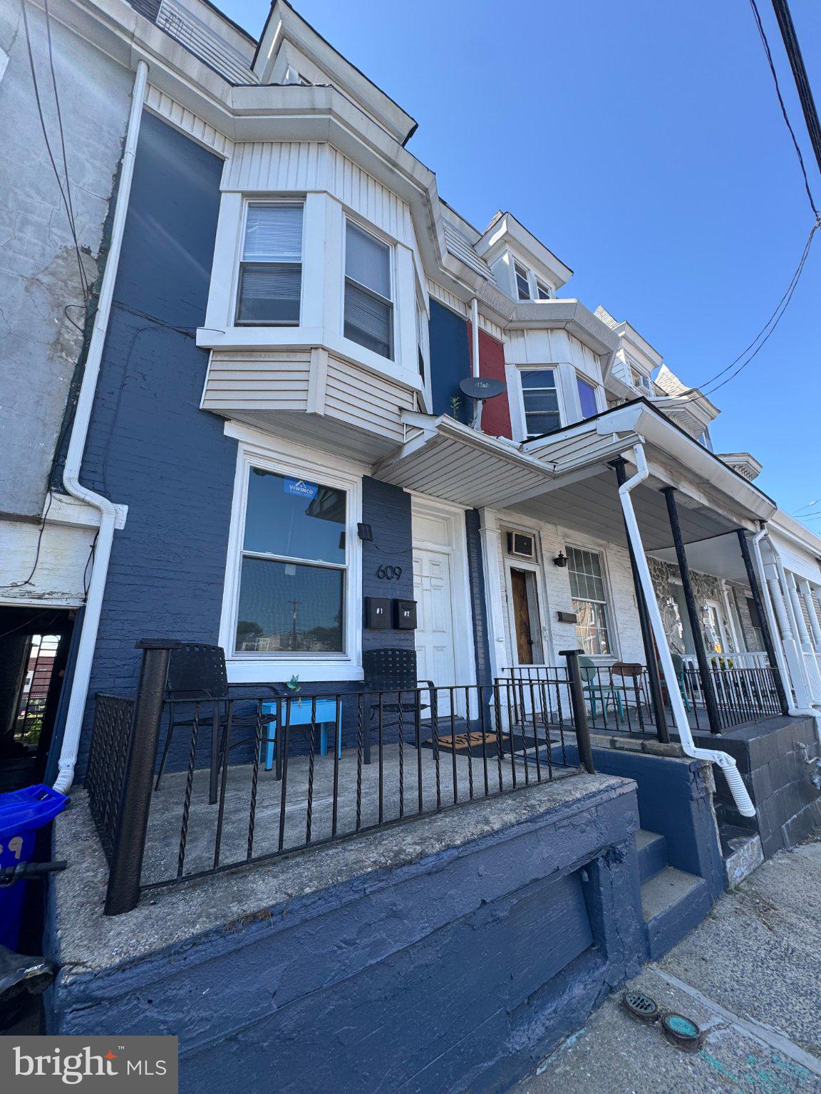 Charming multi-colored facade awaits!