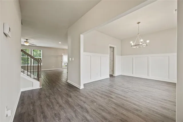 a view of a livingroom with wooden floor
