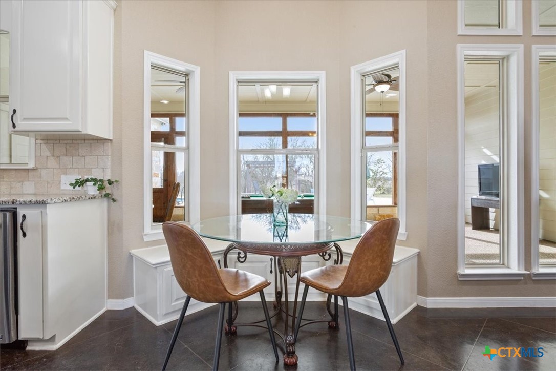 645 West Big Elm Road Troy, TX 76579 - Photo 12 of 39 a dining room with furniture and window