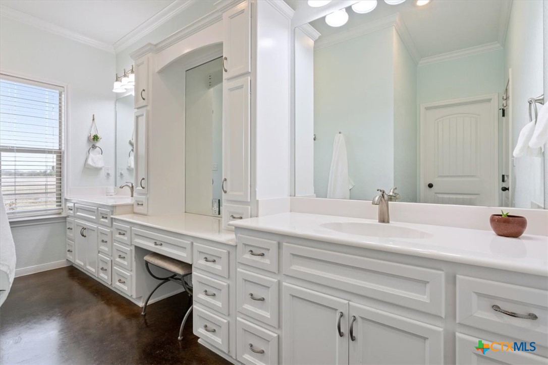 645 West Big Elm Road Troy, TX 76579 - Photo 23 of 37 a bathroom with a sink and a mirror