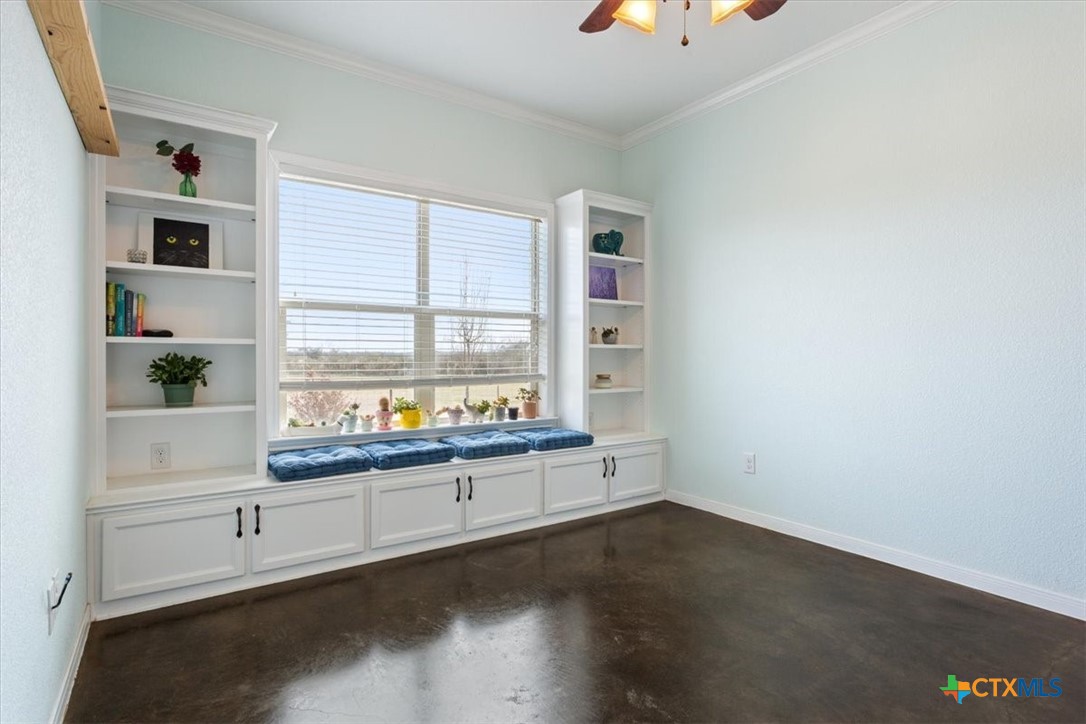 645 West Big Elm Road Troy, TX 76579 - Photo 24 of 37 a room with a desk and a window