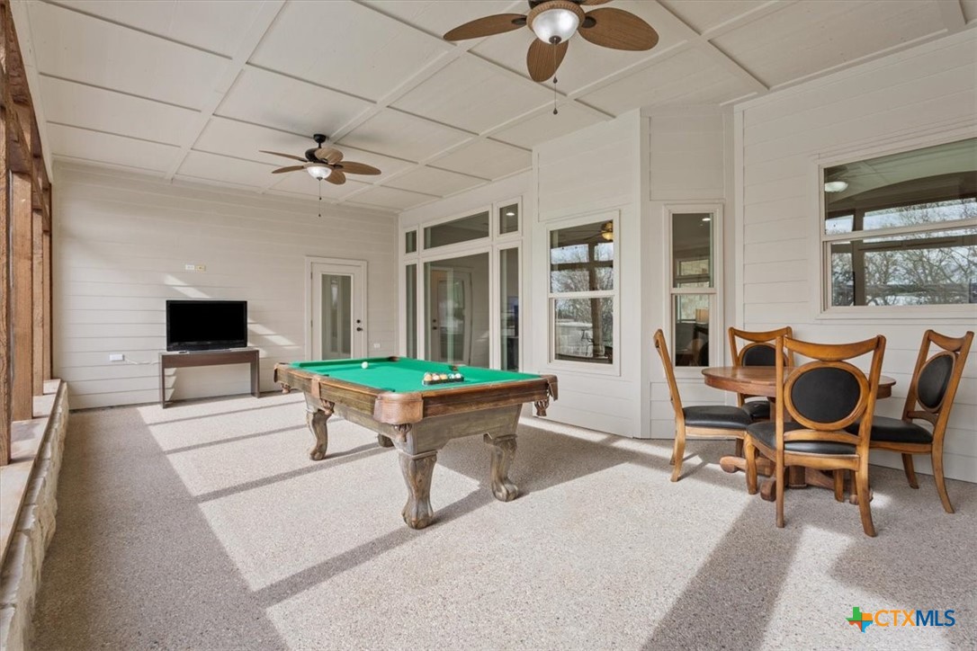 645 West Big Elm Road Troy, TX 76579 - Photo 29 of 39 a room with furniture a flat screen tv and a window