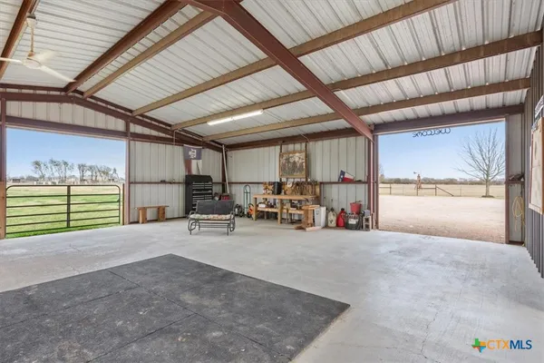 a view of a garage with furniture
