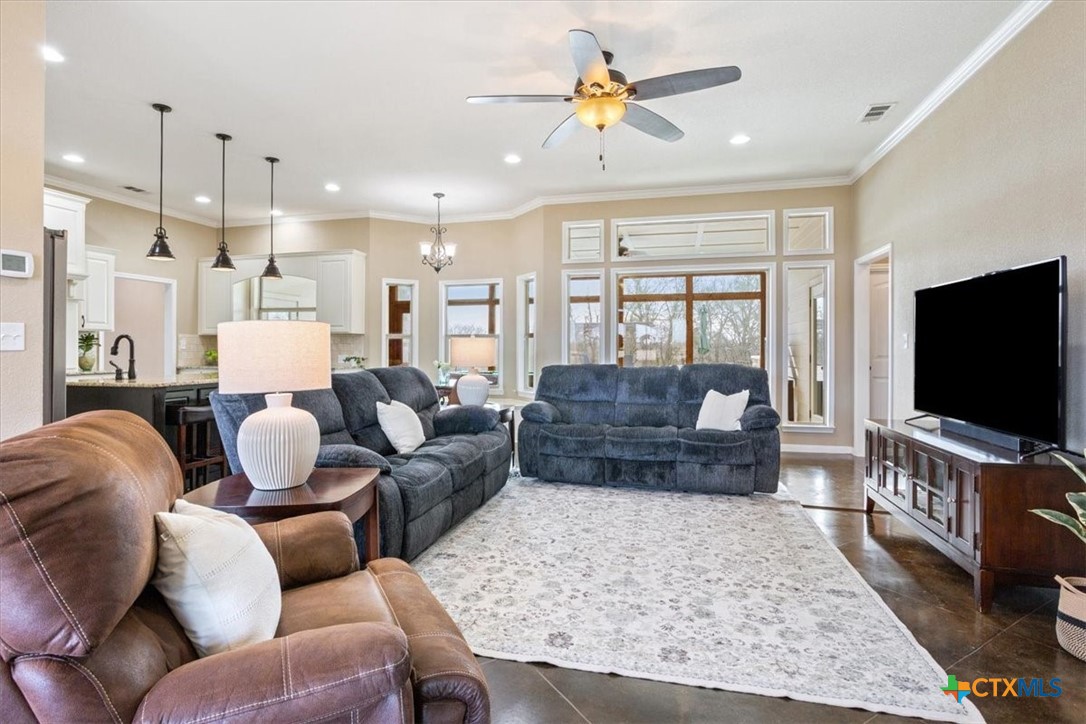 645 West Big Elm Road Troy, TX 76579 - Photo 6 of 39 a living room with furniture and a flat screen tv