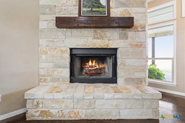 a living room with a fireplace