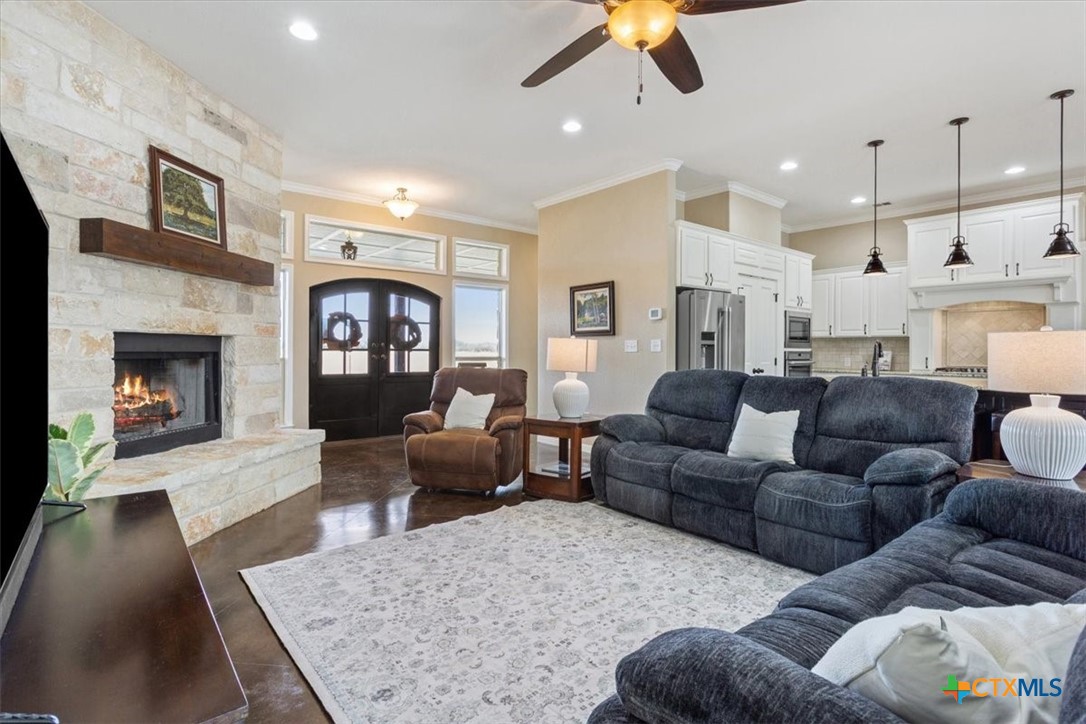 645 West Big Elm Road Troy, TX 76579 - Photo 8 of 37 a living room with furniture fireplace and window