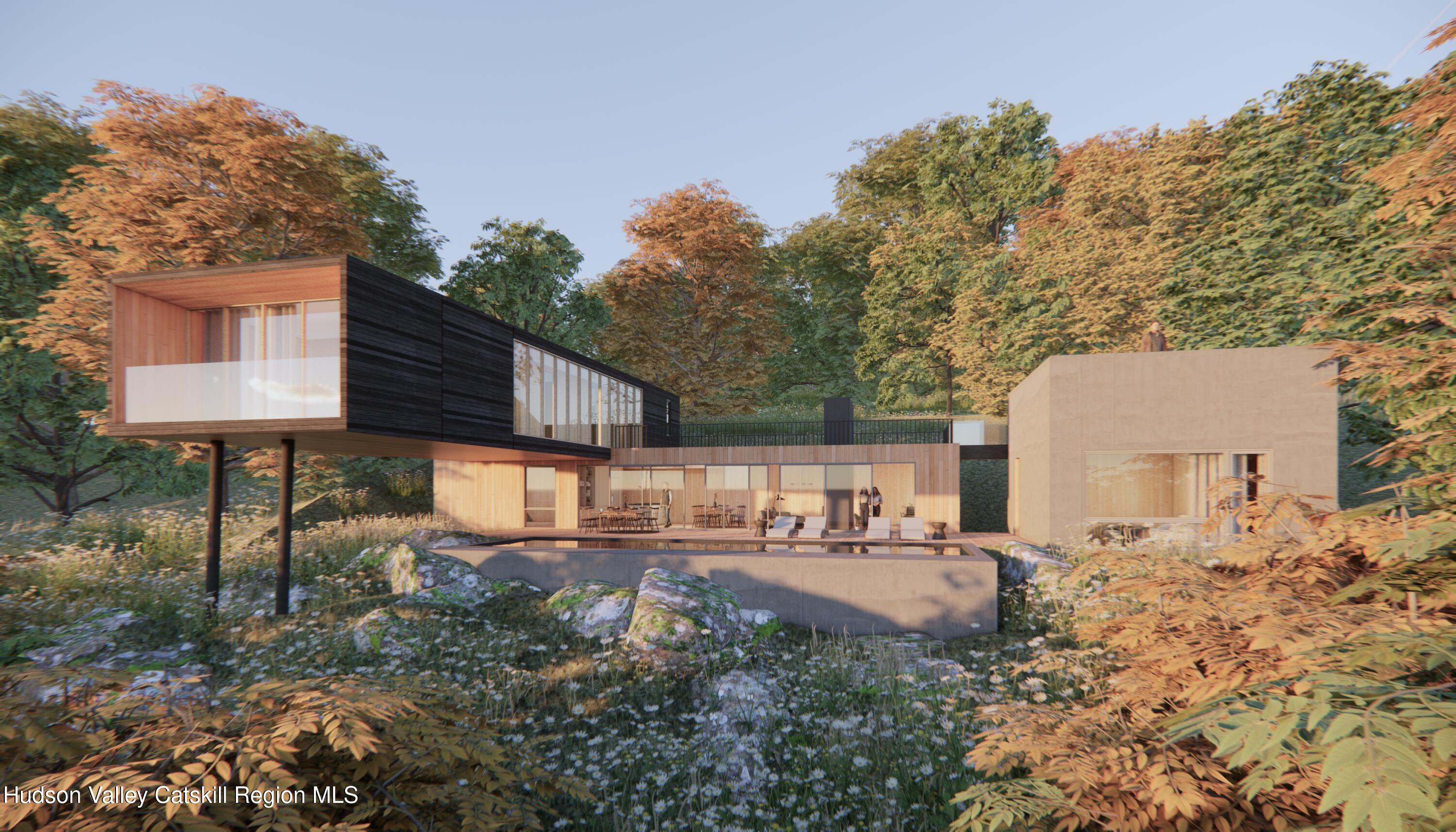 1 Red Rock Road Grahamsville, NY 12740 - Photo 1 of 20 a backyard of a house with table and chairs