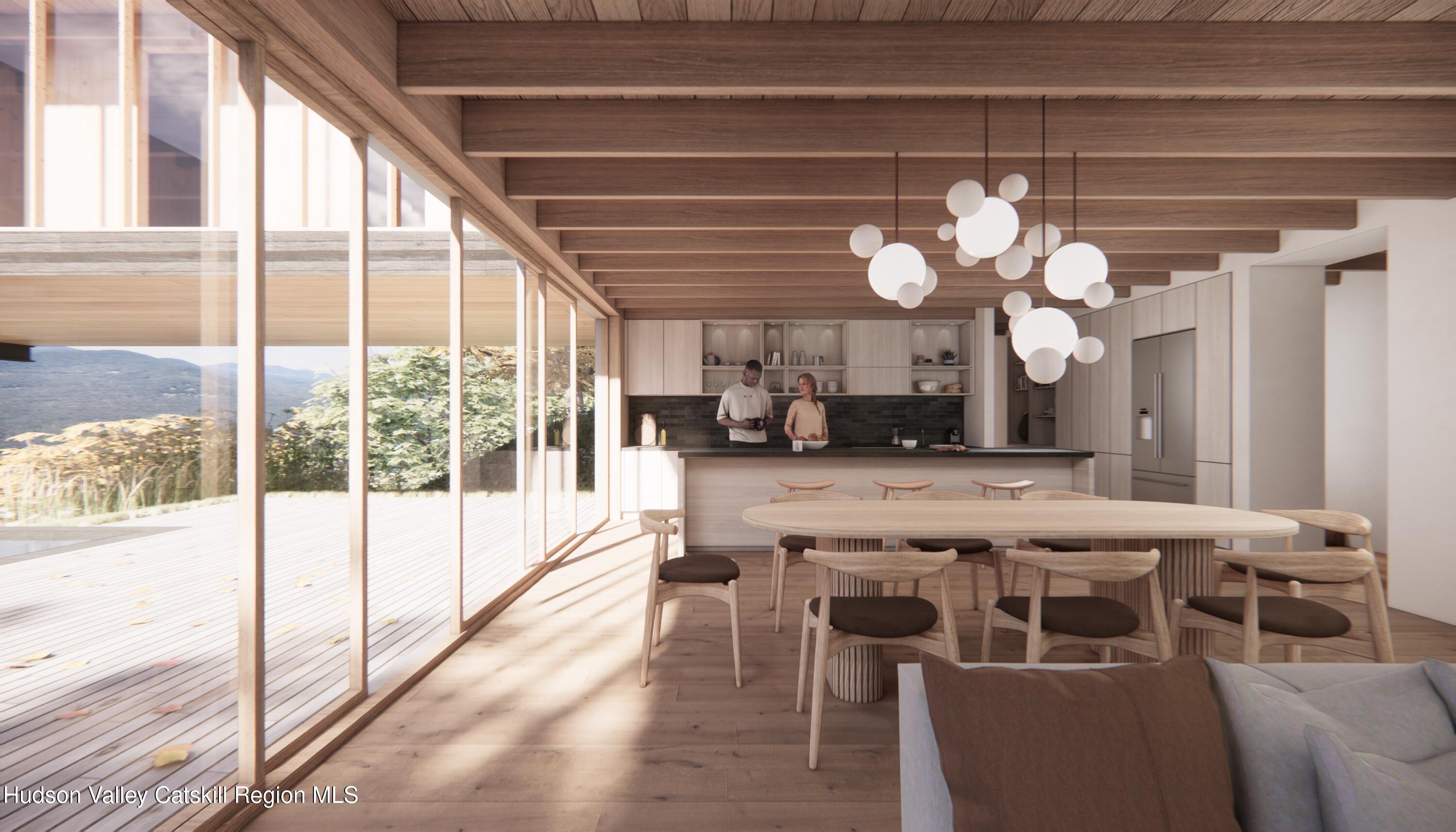 1 Red Rock Road Grahamsville, NY 12740 - Photo 3 of 20 a view of a dining room with furniture a chandelier and large windows