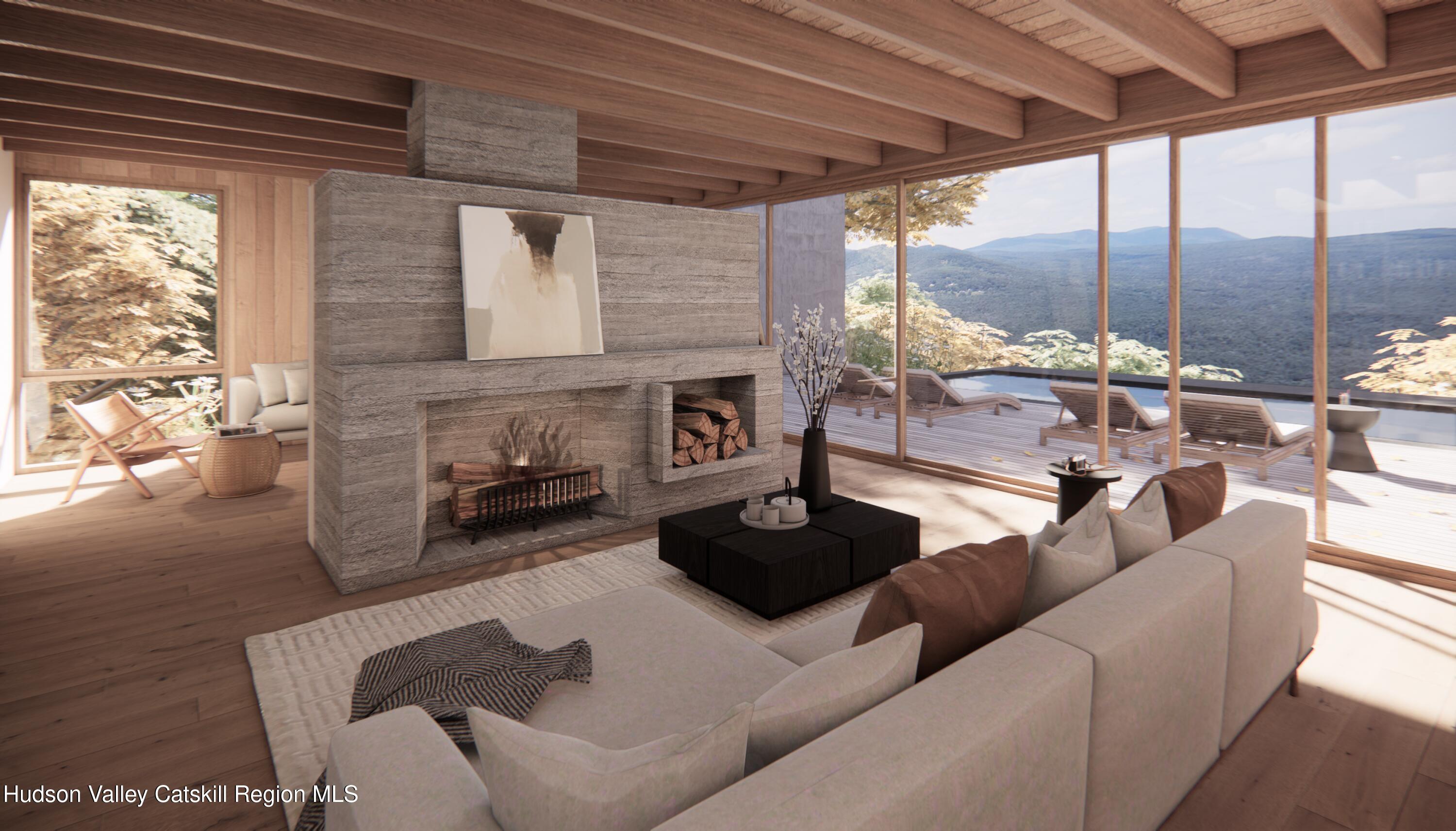 1 Red Rock Road Grahamsville, NY 12740 - Photo 4 of 20 a living room with furniture a fireplace and a table