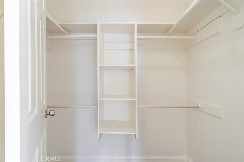 4906 Pacifica Avenue Palmdale, CA 93552 - Photo 24 of 36 a view of an empty walk in closet