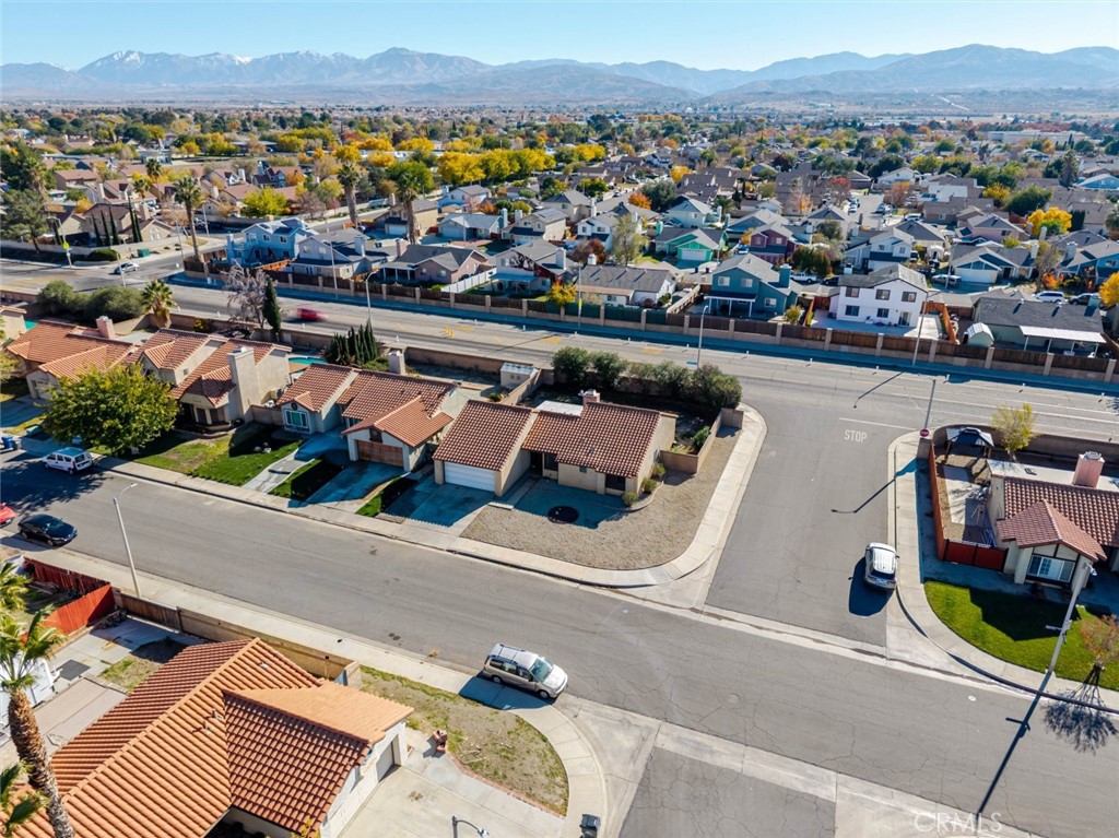 4906 Pacifica Avenue Palmdale, CA 93552 - Photo 32 of 36 an aerial view of a house with a ocean view