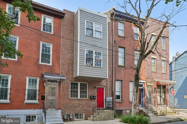 a front view of a multi story building