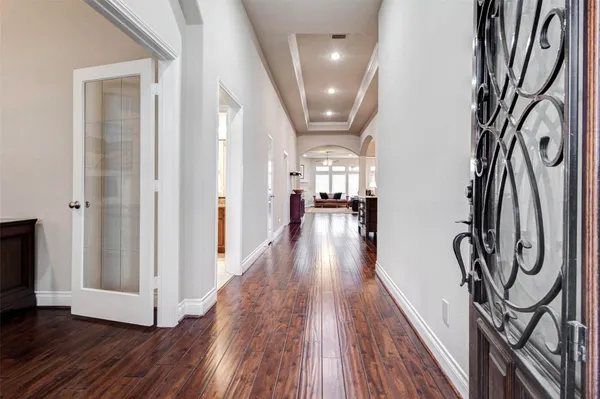 a view of a entryway with wooden floor