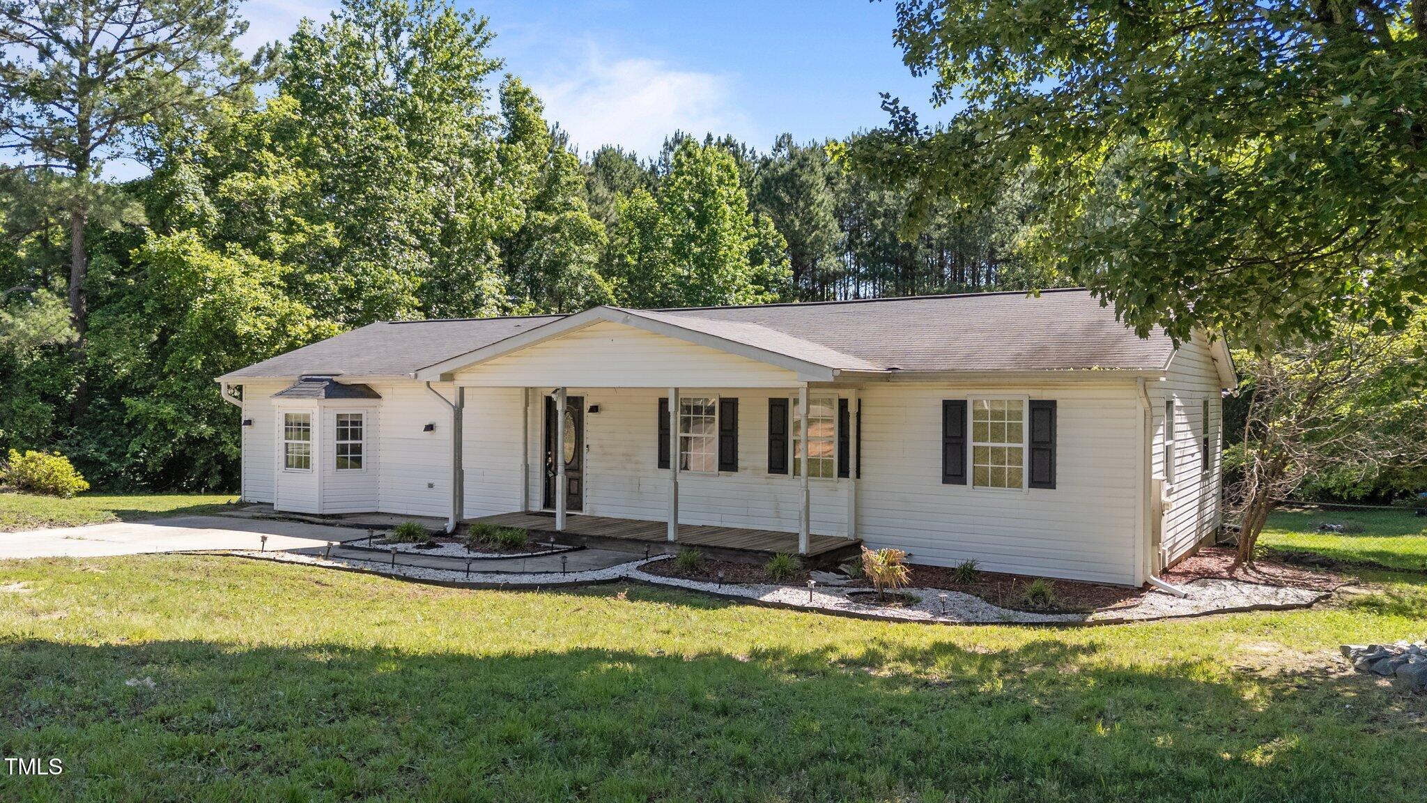 282 Cooke Road Louisburg, NC 27549 - Photo 1 of 40 3-web-or-mls-DJI_20250523100741_0911_D