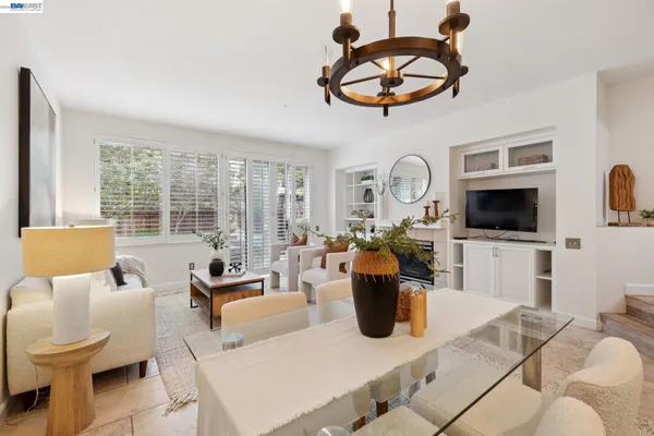 a view of a living room and dining room