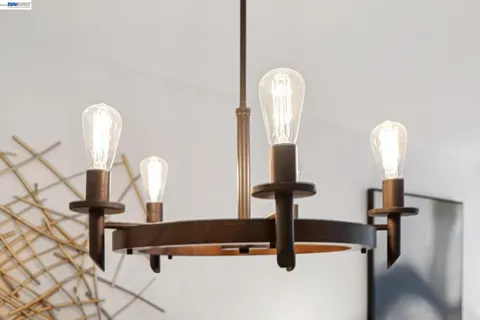 a kitchen with stainless steel appliances granite countertop a sink and a stove