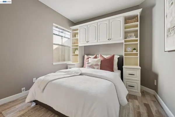 an aerial view of a house with a mountain