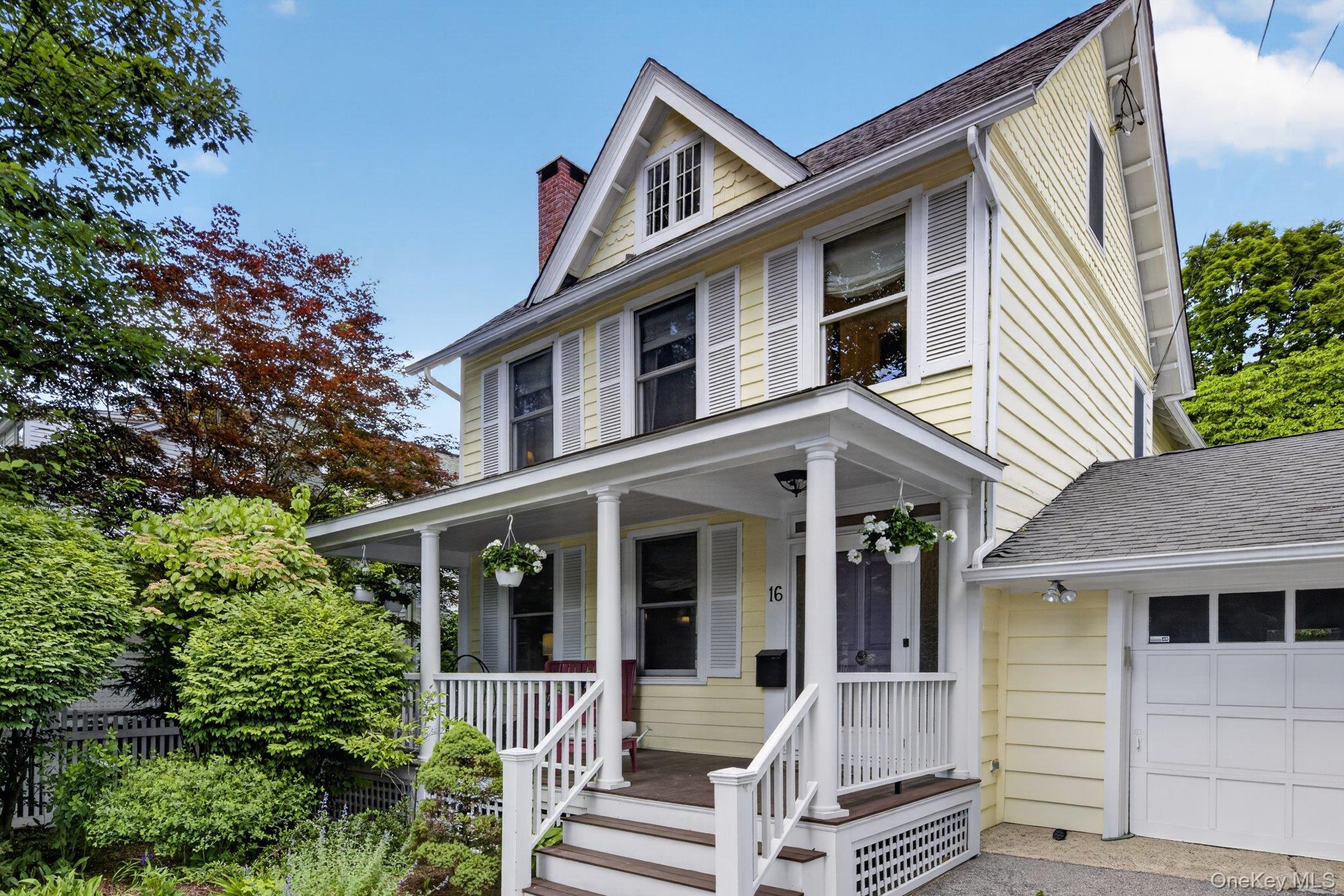 16 Chestnut Street Cold Spring, NY 10516 - Photo 3 of 50 With a covered front porch and driveway