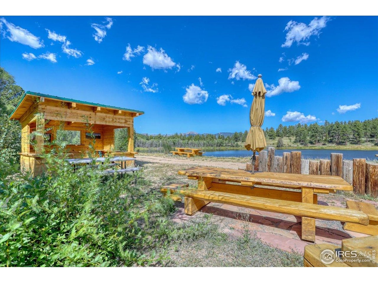 24 Hickok Trail Ward, CO 80481 - Photo 17 of 19 a view of a patio with a table and chairs