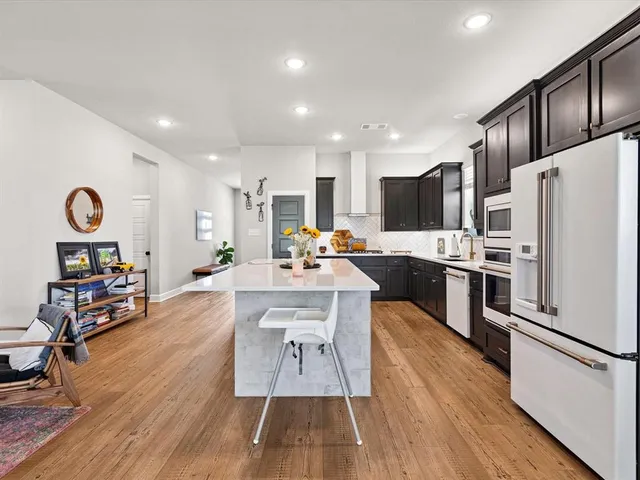 a living room with furniture and a table