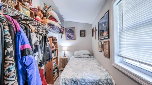 a view of a closet with storage