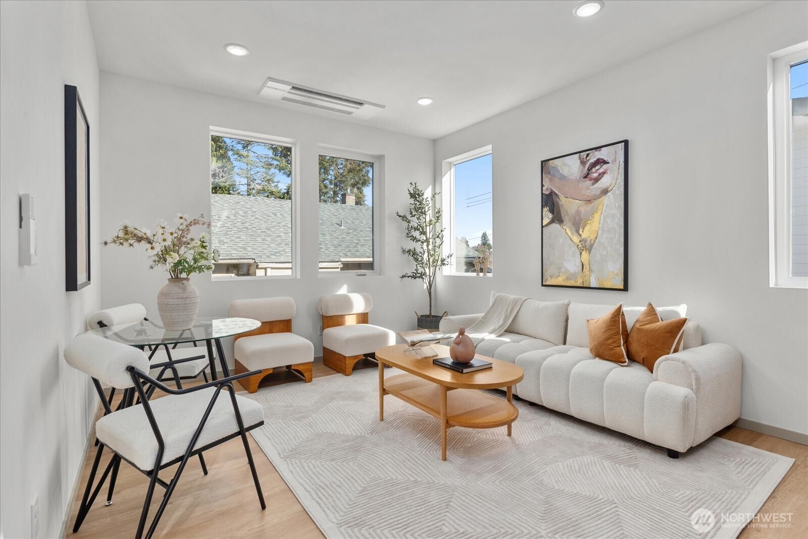 4104 49th Avenue Southwest, Unit B Seattle, WA 98116 - Photo 7 of 17 a living room with furniture and a large window