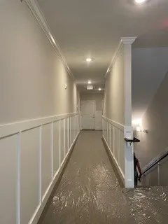 a view of gallery with stairs