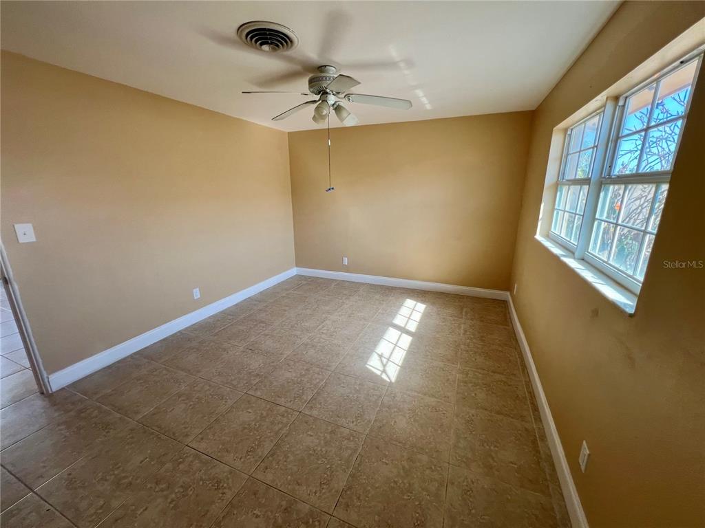 11315 3rd Street East Treasure Island, FL 33706 - Photo 19 of 46 an empty room with a window