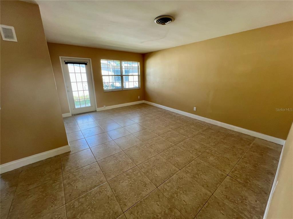 11315 3rd Street East Treasure Island, FL 33706 - Photo 25 of 46 an empty room with windows
