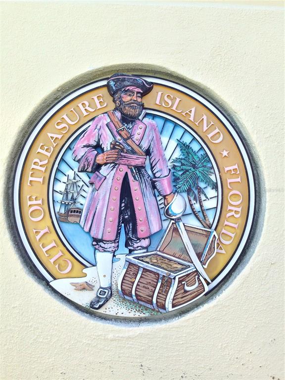 11315 3rd Street East Treasure Island, FL 33706 - Photo 31 of 46 a view of swimming pool with a garden