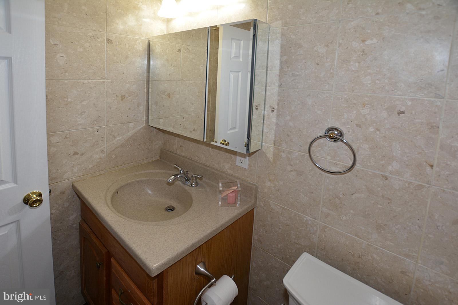 1639 Valencia Way Reston, VA 20190 - Photo 14 of 28 Powder room on first floor
