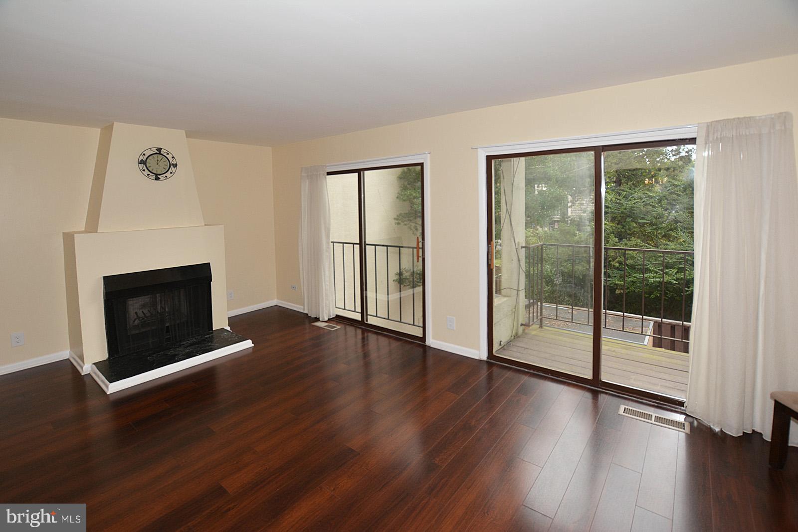 1639 Valencia Way Reston, VA 20190 - Photo 7 of 28 Living room with Beautiful Fireplace